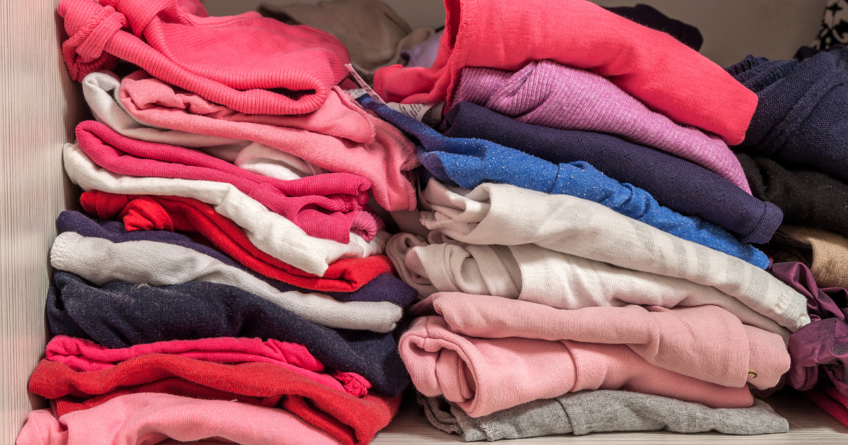 Neatly folded clothes restored after smoke and water damage textile restoration services